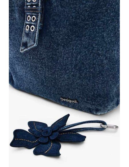 Mochila pequeña denim flor desigual