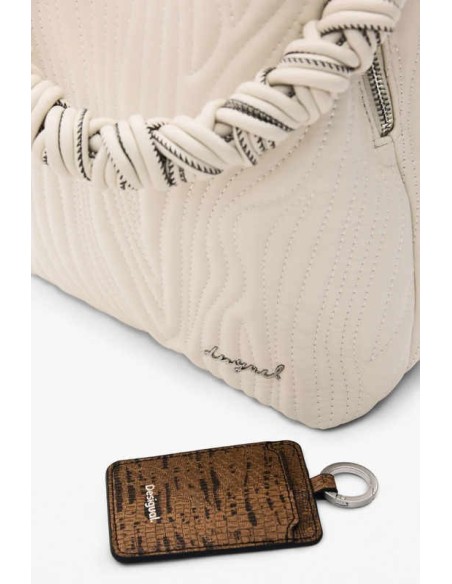 Mochila pequeña relieve desigual beige