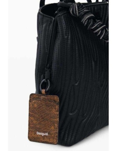 Mochila pequeña relieve desigual negro